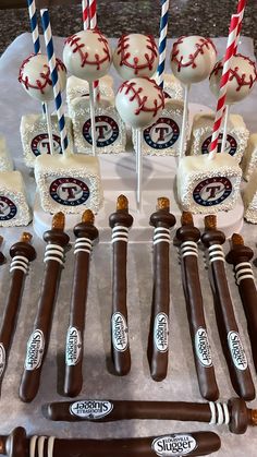 cake pops are arranged in the shape of baseballs