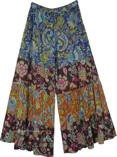 These vibrant cotton pants boast a rich mosaic of paisley and floral patterns rendered in deep shades of different colors against a dark background with different panels.  Made from breathable cotton, these pants are designed to fit a range of sizes with a one-size-fits-all approach, thanks to their flowing, paneled design. #tlb #SplitSkirtsPants #Floral #Printed #bohemianfashion #bohopants Multicolor Floral Print Cotton Pants, Multicolor Cotton Bottoms With Floral Patchwork, Multicolor Paisley Print Wide Leg Pants, Spring Cotton Pants With Paisley Print, Cotton Wide Leg Bottoms With Paisley Print, Multicolor Paisley Print Pants For Spring, Wide Leg Cotton Bottoms With Paisley Print, Multicolor Full Length Cotton Pants, Spring Multicolor Paisley Print Pants