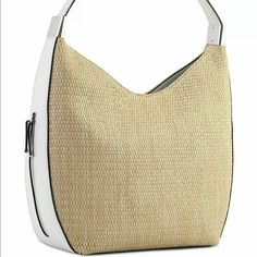 A Roomy Style For All Of The Necessities, This Hobo Bag From Alfani Features A Minimalist Design. Medium Sized Bag; 13"W X 14"H X 4-1/2"D Approx. (Width Is Measured Across The Bottom Of Handbag); 1.18 Lbs. Approx. Weight Silhouette Is Based Off 5'9" Model Approx. 9"L Shoulder Strap Magnetic Snap Closure Silver-Tone Exterior Hardware 2 Interior Slip Pockets & 1 Zip Pocket Tablet Compatible (Std. Size 8"-10") Polyester; Trim: Polyurethane; Lining: Polyester Spot Clean Imported Trendy Hobo Bag With Silver-tone Hardware For Shopping, Chic Silver Rectangular Hobo Bag, Chic Hobo Bag With Silver-tone Hardware For Shopping, Chic Silver Tote Hobo Bag, Chic Silver Hobo Tote Bag, Silver Shoulder Bag With Leather Handles For Shopping, Silver Shoulder Bag For Summer Shopping, Silver Shoulder Bag For Summer, Rectangular Hobo Bag With Silver-tone Hardware For Errands