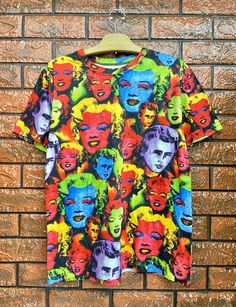 "Vintage 90s Andy Warhol Legendary Pop Art Artwork T Shirt / Pop Culture Art / Andy Warhol / Vintage Punk T Shirt Size M Condition : Good Used Size on tag : M Colour : Multicolor Brand : Unknown Measurement : Armpit to armpit -20\" Length - 26.5\" Material : Cotton Made In: Unknown THE SHIPPING (Your Choice Please read) 1. The shipping cost is USD 20 via Malaysian Registered Postage With Tracking Number. It will take 2-4 weeks or more for delivery, depends on your custom checking. 2. Add USD 10 Andy Warhol Style, Multicolor Screen Print Tops For Streetwear, Multicolor Streetwear Tops With Screen Print, Artistic Multicolor Tops With Graphic Print, Grunge Multicolor T-shirt For Streetwear, Multicolor Graphic Print Top For Streetwear, Artistic Printed Tops For Streetwear, Multicolor Grunge Top For Streetwear, Andy Warhol Outfit