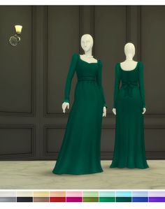 two mannequins dressed in long green dresses