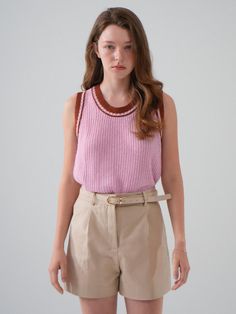 This is a casual and trendy top by VLETI that is made out of high quality and sturdy material. With distinctive mood of the design and comfortable wear, you can style it for your feminine summer outfit.- Relaxed regular silhouette- Ribbed round neckline- Trendy and feminine casual mood Pink Crew Neck Vest For Spring, Trendy Spring Tank Sweater Vest, Trendy Knit Vest For Day Out, Trendy Tank Sweater Vest For Spring, Trendy Tank Sweater Vest For Summer, Summer Knit Vest With Crew Neck, Casual Spring Tank Sweater Vest, Trendy Cotton Knit Tank Top, Casual Spring Knit Vest Top