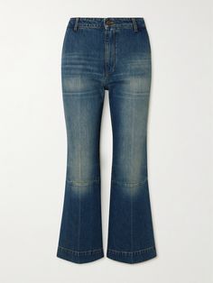 Victoria Beckham's jeans look really retro – they're cut to a cropped length with subtly flared hems accentuated by horizontal seams at each knee. The 'Indigrey' denim feels naturally worn-in thanks to fading through the front and back. Victoria Beckham Jeans, Jeans Look, Flared Jeans, Victoria Beckham, Denim Pants, Women Collection, Flare Jeans, Porter, High Rise