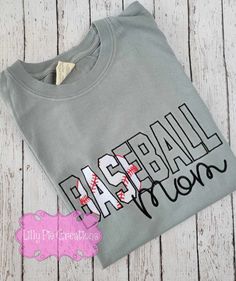 Score a home run in style with our Custom Embroidered Baseball Shirt! Show your love for your kiddos team, by adding their team name or just add "mom" below it . With customizable colors, you'll be the MVP at every game. Swing into action with this unique and personalized shirt! Are you looking for another style or color shirt? I'm happy to help! All items are made to order right here at Lilly Pie Creations Customizable Cotton Baseball Jersey For Fans, Customizable Team-colored Cotton Baseball Jersey, Custom Name Print Cotton Baseball Jersey For Sports Events, Cotton Baseball Jersey With Name Print For Sports Events, Custom Name Print Cotton Baseball Jersey, Customizable Cotton Baseball Jersey For Sports Fans, Customizable Cotton Sports Fan Baseball Jersey, Customizable Cotton Baseball Jersey, Customizable Cotton Sporty Baseball Jersey