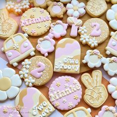 some decorated cookies are laying on a table