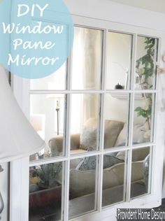 a living room window with the words diy window pane mirror