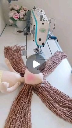 a video demonstrating how to use a sewing machine for scarfs and knitted scarves