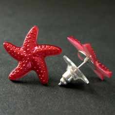 Fuchsia Red Starfish Earrings. Star Earrings with Silver Stud Earring Backs. A pair of fuchsia red starfish with a hint of pink and a soft sheen to their surface have been set on silver plated post earrings complete with matching earring backs. These earrings are available in a variety of colors! http://etsy.me/1DuDuC3 Starfish Size: 19mm If you would like to order a larger quantity than what's offered in this listing, please contact me for availability! Stop by and visit http://stumblingonsaint Nickel-free Red Star Earrings, Red Star-shaped Nickel-free Earrings, Red Star-shaped Jewelry For Parties, Red Star-shaped Party Jewelry, Red Star-shaped Earrings For Party, Red Star-shaped Party Earrings, Nickel-free Red Earrings For The Beach, Starfish Earrings, Handmade Design