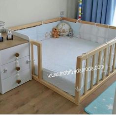 there is a baby crib in the room