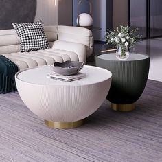 a living room filled with furniture next to a white couch and coffee table on top of a carpeted floor