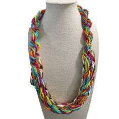 Double Strand Multi-Color Seed Bead And Metal Necklace -- 24". This necklace has a double strand made up of Six strands of glass beads: Orange, Blue, Red, Green, Pink, and Bronze. These strands are fed through an open gold-tone metal link, Measurements: Length: 24; Width: 1-1/2"; Extender: 3"0 Multi-strand Glass Necklace With Colorful Beads, Multi-strand Glass Beaded Colorful Necklace, Multi-strand Glass Bead Colorful Necklace, Colorful Multi-strand Glass Bead Necklaces, Multicolor Multi-strand Jewelry For Party, Adjustable Multicolor Long Necklace With Colorful Beads, Multicolor Multi-strand Party Jewelry, Glass Multi-strand Necklace With Colorful Beads, Multicolor Multi-strand Costume Jewelry Beads