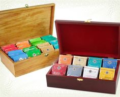 a wooden box filled with lots of different types of soaps in it's contents