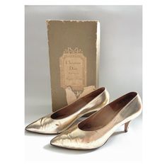 ** shoecollector alert ** Rare pair of metallic gold 60s (?) vintage Christian Dior court shoes, designed by Roger Vivier. Original box. Condition: as seen. Shoes can be professionally restored however they are perfect for a display, in my opinion, as they are. The slip-on style kitten heel pumps features a pointed toe and internal gold inscription "Christian DIor créé par Roger Vivier". The shoes are handmade in France and have a number written internally however hard to read. I bought them in Classic Gold Court Shoes With Almond Toe, Classic Gold Pointed Toe Court Shoes, Classic Gold Closed-toe Court Shoes, Classic Closed Toe Gold Court Shoes, Vintage Almond Toe Court Shoes For Party, Classic Gold Closed Toe Court Shoes, Classic Gold Closed Toe Heels, Classic Gold Court Shoes For Formal Occasions, Classic Gold Court Shoes For Party