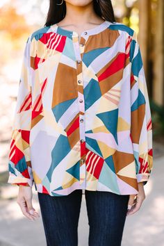 This blouse is so bold and fun! We love that colorful abstract print! This blouse is going to be perfect for a day in the classroom molding minds or for lunch with the girls! You can easily pair this blouse with jeans or a pair of tailored slacks. This blouse features long bubble sleeves, a round neckline, button down front closure, and a colorful abstract print. 
Material has no amount of stretch.Cindy is wearing the small. Mint Julep Boutique, Mint Julep, Model Fits, Personal Marketing, Colorful Abstract, Egift Card, In The Classroom, Abstract Print, Be Perfect