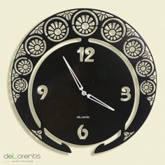 a black and white clock with numbers on it