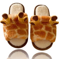 PRICES MAY VARY. Comfort Warm Material:This cute animal slipper.Superior soft plush fabric, thick and velvety, along with comfort man-made plush fleece lining,warm and comfortable, not easy to deform, ultra skin-friendly, lightweight and comfy. Your feet will be surrounded by extremely cozy lining, like walking on a mushmallow. Features and Design: Cute cartoon giraffe shape, warm and simple, with a sense of design and cuteness, exquisite craftsmanship, and clever thinking. According to ergonomi Giraffe Slippers, Cartoon Giraffe, Cotton House, Animal Slippers, Plush Slippers, Bedroom Slippers, Cute Slippers, Soft Slippers, Outdoor Slippers