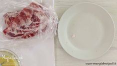 the meat is wrapped in plastic and ready to be put into the freezer bag