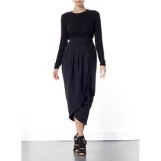 The Blake Tulip skirt is super flattering on any size. Coming in one size fits all, this wrap-around tulip style is designed to sit high on the waist. It's finished with a wrap-around belt that ties at the side, to nip in your waist for a flattering effect. Tie into a bow or leave as it is. This dramatic outline is best complemented with a fitted top. Hand wash recommended Wash with like colours to avoid colour transfer Press on reverse side Iron on low heat  100% polyester