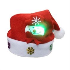 a red and white hat with snowflakes on it's side, light up in the shape of a smiling face