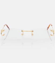 Rectangular glasses in gold - Cartier Eyewear Collection | Mytheresa Cartier, Square Sunglasses, Metal Frame, Designing Women, Sunglasses Accessories, Clothing And Shoes, Jewelry Accessories, Bag Accessories, Shoe Bag