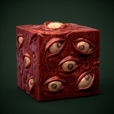 a red cube with eyes on it