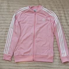 Adidas Big Girl Pink Zip Up Jacket Sz L. Nwot. Zippered Pockets. Light Weight. Trendy White Outerwear With Ribbed Cuffs, Pink Hooded Track Jacket For Winter, Pink Sporty Long Sleeve Outerwear, Pink Fitted Outerwear With Ribbed Cuffs, Fitted Pink Outerwear With Ribbed Cuffs, Pink Adidas Winter Outerwear, Pink Adidas Long Sleeve Outerwear, Adidas Long Sleeve Track Jacket For Spring, Adidas Pink Long Sleeve Outerwear