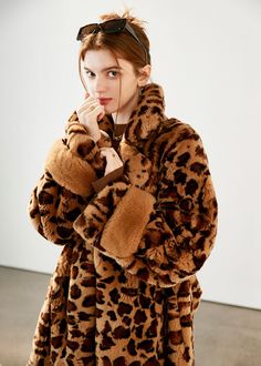 Look wild and stay warm this winter with this fierce leopard-print Rex rabbit fur coat. This midi-length masterpiece is the perfect combination of sassy style and cozy comfort, making it the best winter outerwear for savvy fashionistas! Natural Rex rabbit fur Notched collar Waist belt Midi length Lined Side slip pockets Women's winter outerwear Item 310231 Size info XS=US2=UK6=EU32 S=US4-6=UK8-10=EU34-36 M=US8-10=UK12-14=EU38-40 L=US12=UK16=EU42 ★★ It would be helpful if you provided your height Leopard Print Fur Coat With Faux Fur Trim, Winter Leopard Print Faux Fur Outerwear, Fall Leopard Print Faux Fur Coat, Leopard Print Outerwear With Faux Fur Trim, Winter Leopard Print Outerwear With Faux Fur Trim, Leopard Print Faux Fur Coat With Lining, Fall Leopard Print Fur Coat With Faux Fur Lining, Leopard Print Faux Fur Coat, Sassy Style