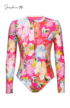 Drenched in vibrant energy, this paddlesuit by Sunshine 79 features a bright hot pink floral print that radiates an atmosphere of tropical exuberance. A half zipper makes it easier to put on and take off, while long sleeves keep you protected from the harsh rays of the sun. Tummy control masks worry areas for a shape-slimming silhouette. [split] Details Paddle suit one piece Half-zip front detail Removable cups Tummy control UPF 50 Fabric 83% Nylon, 17% Lycra Elastane Long Sleeve Floral Print Swimwear For Surfing, Tropical Long Sleeve Fitted Swimwear, Fitted Long Sleeve Tropical Swimwear, Floral Print Swimwear For Surfing In Spring, Vibrant Pink Floral Print Swimwear, Tropical Pink Swimwear With Vibrant Print, Pink Tropical Swimwear With Vibrant Print, Spring Pink Swimwear With Vibrant Print, Vibrant Pink Printed Swimwear