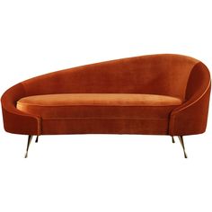 an orange couch sitting on top of a white floor next to a wooden frame and metal legs