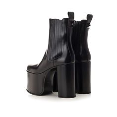 100% calf leather - Leather lining, insole, sole - Two side elasticated panels - Rounded toe - Pull tab at the rear - Heel 12,5 cm / 4,9 in | Valentino Garavani Women's Garavani Ankle Leather Boots in Black | SS23 Chelsea Boots With Sculpted Heel And Medium Width, Chelsea Boots With Sculpted Heel And High Ankle, Ankle-high Calf Leather Heeled Boots With Padded Heel, Formal Calf Leather Platform Boots With Leather Sole, Formal Calf Leather Platform Boots, Modern High Heel Chelsea Boots With Reinforced Heel, Ankle-high Chelsea Boots With Rubber Heel Cap, High Ankle Heeled Boots With Leather Sole, High Ankle Heels With Leather Sole