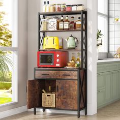 a kitchen area with a microwave and shelves