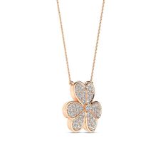 This Lucky Necklace showcases a floral motif with each petal embellished in diamond accents that capture the timeless beauty of blossoms. The floral diamond necklace design symbolizes luck and prosperity, making it a thoughtful and cherished gift. Diamond Jewelry With Flower Charm, Elegant Flower Shaped Jewelry With Single Cut Diamonds, Elegant Flower-shaped Jewelry With Single Cut Diamonds, Exquisite Diamond Flower-shaped Jewelry, Diamond Pendant With Flower Charm, Rose Gold Diamond Jewelry In Flower Shape, Formal Flower Shaped Jewelry With Pave Setting, Rose Gold Diamond Flower Shaped Jewelry, Luxury Jewelry With Rose Cut Diamonds In Flower Shape