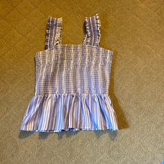 Size Medium Smocked And Stretchy Never Worn Casual Blue Top With Smocked Back, Blue Summer Top With Smocked Back, Casual Blue Smocked Top For Summer, Blue Smocked Top For Summer, Blue Smocked Top With Smocked Back For Summer, Blue Smocked Top For Vacation, Blue Smocked Top With Smocked Back For Vacation, Blue Smocked Back Top For Summer, Blue Smocked Top For Spring Day Out