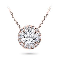 This halo pendant setting is stunning and can accommodate a round center diamond of your choice from 0.20-5.0ct. Pendant features approx. 18 G-H VS diamonds at approx. 0.20cttw. Metal options are 14k and 18k white and yellow gold, 18k rose, or platinum and includes a 16 chain. Classic Round Pendant Jewelry, Unique Diamond Pendant, Cushion Cut Solitaire, Round Diamond Pendant, Solitaire Diamond Pendant, Diamond Pendants Designs, Halo Necklace, Diamond Solitaire Necklace, Sparkly Things