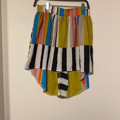 Most Amazing Skirt Ever With The Colors. Also Has An Elastic Band Around The Waist Perfect For Summer Or Spring Work Or Play!Can Also Be Worn With The Belt If Chose To Playful Summer Skirt, Multicolor Asymmetrical Lined Skirt, Multicolor Flowy Asymmetrical Skirt, Trendy Striped Mini Skirt For Summer, Playful Beach Skirt For Summer, Casual Multicolor Mini Skirt For Summer, Spring Casual Mini Skirt With Asymmetrical Hem, Trendy Multicolor Tiered Skirt, Multicolor Mini Skirt For Summer Day Out