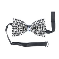 ✨ Elevate your formal attire with our Exquisite Black and Silver Crystal Bow Tie. Perfect for special occasions, this luxurious accessory features an intricate arrangement of sparkling black and silver crystals, adding a sophisticated touch to any ensemble. Whether you're attending a gala, wedding, or black-tie event, this statement piece ensures you shine with unparalleled elegance and style. Crafted with precision, this bow tie combines durability and charm, making it a versatile addition to a Black Bow Tie With Decorative Bow For Evening, Black Decorative Bow Tie For Evening, Elegant White Bow Tie For Party, Elegant Black Bow Tie For Party, Elegant Silver Bow Tie For Gift, Elegant Silver Bow Tie For Formal Occasions, Elegant Silver Formal Bow Tie, Luxury Bow Tie For Party, Silver Party Bow Tie