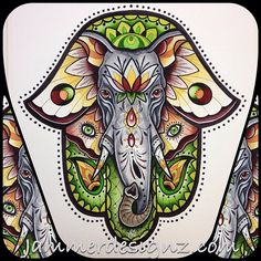 an elephant is painted on the side of a white wall with green, orange and yellow designs