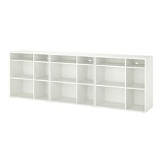 a white bookcase with six shelves on each side