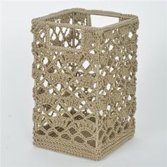 a crocheted basket is shown on a white background