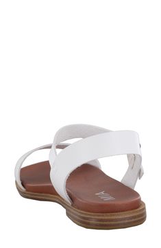 An anatomically contoured footbed adds everyday comfort to this sleek, strappy sandal. Flat sole Contoured footbed Synthetic upper, lining and sole Imported Summer Footbed Sandals With Arch Support And Ankle Strap, Medium Width Slingback Beach Sandals, White Strappy Sandals With Cushioned Footbed, White Footbed Sandals With Ortholite Insole For Summer, Everyday Synthetic Slingback Sandals For Spring, Beach Ankle Strap Footbed Sandals With Arch Support, Ankle Strap Footbed Sandals With Arch Support For Beach, White Ortholite Footbed Sandals For Summer, Adjustable Summer Footbed Sandals With Arch Support