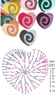 crocheted hearts are arranged in the shape of a ferris wheel