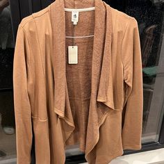 Camel Sweater/Cardigan - Size L From Vici Casual Camel Sweater For Fall, Camel Long Sleeve Top For Winter, Camel Long Sleeve Tops For Spring, Casual Camel Sweater For Spring, Camel Sweater For Workwear In Fall, Casual Camel Top For Fall, Camel Long Sleeve Sweater For Fall, Long Sleeve Camel Sweater For Fall, Brown Open Front Top For Layering