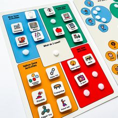 two board games, one with buttons and the other with words on them are shown