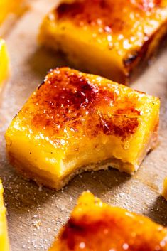 slices of pineapple upside down on a cutting board with some sugar sprinkled on top