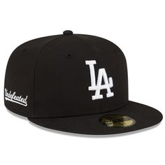 Rep the Los Angeles Dodgers in style with this 59FIFTY Fitted Hat from New Era x Undefeated. The hat features a color contrast undervisor to add some flair to your classic game day look. The hat displays embroidered Los Angeles Dodgers graphics so that everyone will be able to see your unwavering devotion for your favorite MLB team! La Dodgers Hat Outfit, Hat Displays, Nike Shoes Women Fashion, New York Yankee Hat, Dodger Hats, Popular Hats