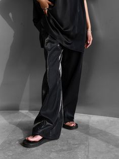 Chic and luxurious silky trousers with wide leg. Super comfortable. Wide leg creates relaxed flowing pants that are easy to wear. Model is in MINUSEY ONE SIZE. ✔️ Free worldwide express shipping over $100 ✔️ Loved by 6,500+ customers ✔️ Limited edition collections, maximum style ⠀⠀⠀⠀⠀⠀⠀⠀⠀ Stay ahead of the trend with can’t-find-anywhere-else staples. Your closet will thank you 💕 * MINUSEY ONE SIZE = EU 34-38, US2-6* 100% Polyester* Dry clean* Made in Korea - Model Height: 172cm/5'7" (US2, EU34) Sleek Silk Wide Leg Bottoms, Sleek Satin Wide Leg Pants, Silk Wide Leg Pants For Summer, Summer Wide Leg Silk Pants, Wide Leg Silk Pants For Summer, Casual Satin Straight Leg Pants, Casual Straight Leg Satin Pants, Silk Wide Leg Pants For Night Out, Summer Satin Straight Leg Bottoms