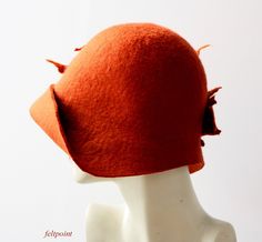 "Rust cloche hat Art Deco Felt hat felted hat Womens hat cloche hat felt hats felted hats Retro hat La belle epoque Art Deco, 1920s hat, Art Hats Rust orange hat cloche hat 1920's woman hat, Gatsby hat, Miss Fisher hat, Unique hat Hats&Caps Accessories Wool Merino wool Handmade Great, very flattering hat in the style of 1920's ! Soft and durable ! Adapts to the head ! Special and unique ! Sophisticated and elegant ! This hat is in rust/orange color with leaves in shades of rust/orange I can Unique Winter Brimmed Hat, Unique Brimmed Winter Hat, Fitted Felt Cloche Hat, Adjustable Felt Cloche Hat, Adjustable Cloche Felt Hat, Handmade Winter Cloche Hat, Fishers Hat, Art Hats, 1920s Hats