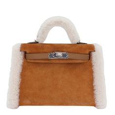 Brand: Hermès Style: Kelly Mini Teddy Size: 20cm Color: Chamois/Ecru/Alezan Material: Suede/Shearling/Swift Leather Dimensions: 7.5" W x 4.5" H x 2.25" D Handle Drop: 2.5" Strap Drop: 18.5" Hermes Clothes, Mini Kelly, Hermes Style, Hermes Box, Kelly Bag, Pretty Bags, Hermes Bags, Boot Bag, Brown Bags