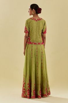 Green lehenga featuring floral silk applique motifs and sequin embellishments. Comes with chevron bead embellished blouse, scalloped hem dupatta and inner slip. - Aza Fashions Green Lehenga, Lehenga Blouse, Embellished Blouse, Floral Applique, Set Women, Green Blouse, Green Silk, Scalloped Hem, Aza Fashion