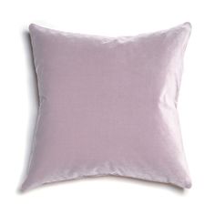 a light purple pillow on a white background